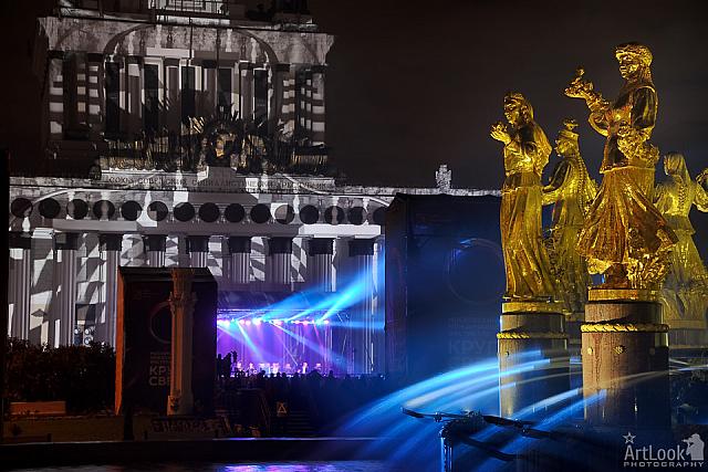 Blue Spotlights Over Concert Scene and Friendship of Nations Fountain