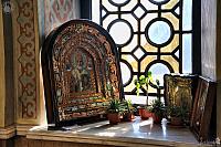 Old Icons and Flowers on the Window Sill