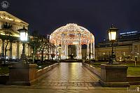 Arch with Dome Framed by Street Lights at Theater Square in Dusk