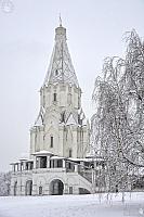 Snow-Covered Ascension Church Framed by Birch Tree