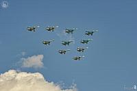Tactical Wing of Ten Sukhoi Fighters in Blue Sky over Red Square