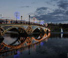 Illuminated Bridge, Sailboat and Flower at Twilight