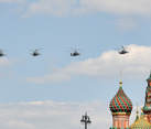 Ka-52 Alligator Attack Helicopters at Domes of St. Basil’s Cathedral