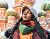 In Background of Amazing Domes of St. Basil’s Cathedral in Snow