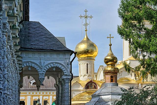 Refectory Porch and Golden Church Domes Framed by Trees