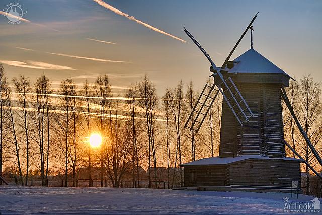 Amazing Winter Sunset Behind Trees at the Tent-Roof Windmill