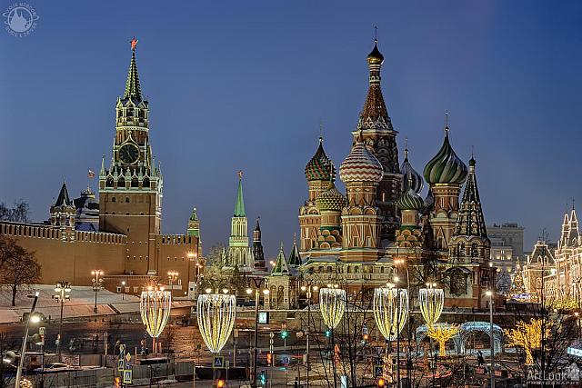 Kremlin Clock Tower and St. Basil’s Cathedral Framed by Festive Street Lights in Twilight