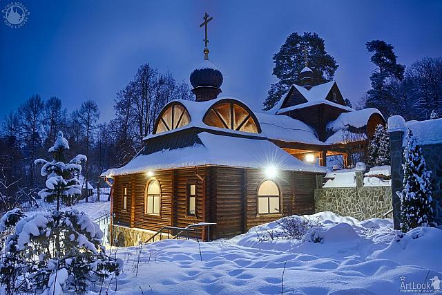 Wooden House-Chapel with Font After Snowfall in Winter Twilight