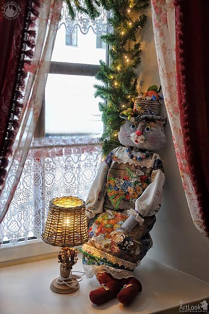 Handmade Doll Cat and Wicker Lamp in Suzdal Restaurant