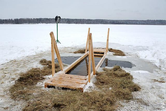 Cross-shaped Ice Hole with Wooden Platform
