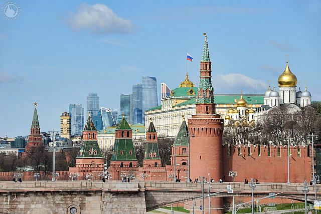 Towers of Moscow Kremlin Against Moskva-City in Spring