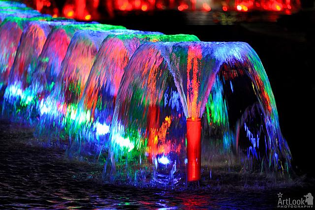 Colorful Water Jets of Wine-Glass Shape Fountains in Victory Park