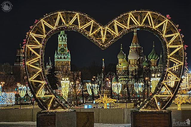 Spasskaya Tower and St. Basil’s Cathedral Framed by Illuminated Love Heart at Night