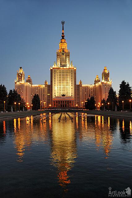 Moscow State University at Twilight with Golden Reflection in Water