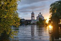 Forty Martyrs Church with Reflections on River Trubezh at Sunset