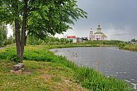 Kamenka River and the Church of Elijah the Prophet Framed by Tree