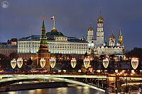 Lights of Bolshoy Kamenny Bridge at Moscow Kremlin in Twilight