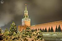 Kremlin’s Spasskaya Tower Framed by Christmas Trees in Snow