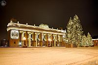 Illuminated Gates of Gorky Park & Christmas Trees in Winter Morning