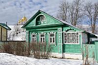 Green Russian Wooden House on Kropotkinskaya Street in Winter