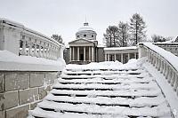 Snow Covered Steps with Balustrade in Colonnade