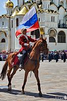 Cheerful Cossack with Russian Flag