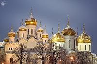 Snow-Covered Golden Domes of Moscow Kremlin in Twilight