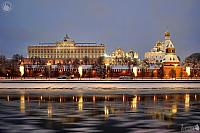 Moscow Kremlin with Reflection in Icy Moskva River in Twilight