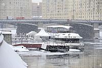 Docked River Palace at Pier Kievskaya in February Blizzard