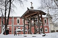Old Style Belfry with Bells in the Snow