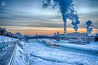 Frozen Moskva River and Rostovskaya Embankment at Winter Sunset