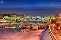 River Boat at Frozen Berth at Berezkkovskaya Emb. in Winter Twilight