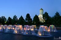 Colorful Fountains and Church of St. George in Twilight