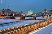 Rostovskaya Embankment and Borodino Bridge in Winter Twilight