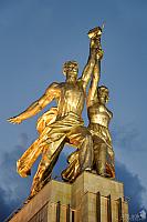 Sculpture of Worker and Collective Farmer in Gold Light at Sunset