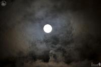 Supermoon Between Clouds Over Red Square