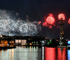 Red Bursts of Fireworks over Peter the Great Monument