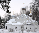 The Church of Archangel Michael framed with Trees in Snow