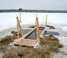 Cross-shaped Ice Hole with Wooden Platform