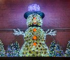 Snowman in Hat with Christmas Trees at the Wall of Power Plant #1