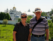 At background of Pokrovsky Convent in Suzdal